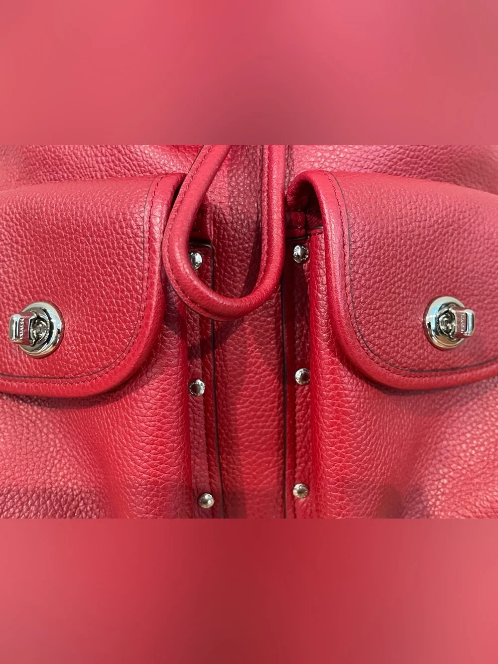 Coach EUC Red Pebble Leather Turnlock Backpack with stud pocket detail. ♥️ ❤️